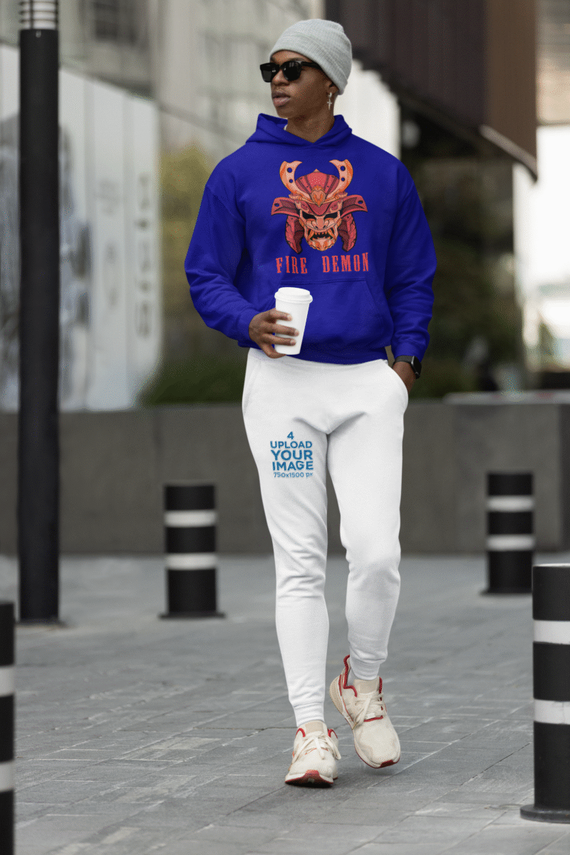 Men’s Fire Demon Samurai Hoodie by PodLyft in navy blue, on a mannequin, featuring a bold red and orange samurai helmet design with a demonic face and 'FIRE DEMON' text, displayed in a modern store with blurred clothing racks in the background.