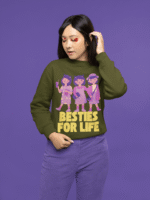 Young girl wearing an olive green sweatshirt with a colorful 'Besties For Life' graphic featuring three cartoon-style girls, set against a purple background. The design celebrates friendship in a playful and vibrant style - PodLyft's Sweatshirt for Besties