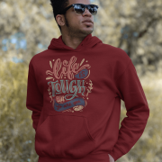 A maroon Men's Tough Spirit Hoodie from PodLyft, showcasing a striking streetwear design with gritty, expressive graphics, combining comfort with a bold aesthetic.