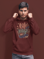 Man wearing PodLyft Men's Tough Spirit Hoodie in Deep Burgundy featuring motivational quote 'Life is Tough But So Are You' in bold, colorful retro typography – streetwear style for everyday confidence.