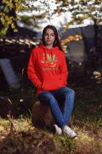A red Nature Angel Hoodie from PodLyft, with a fairy-inspired design, perfect for fans of fairy style fashion.