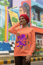 Women’s Vibrant Floral Sweatshirt in coral with Stay Bright design by PodLyft, showcasing vibrant floral graphics for a trendy outfit.