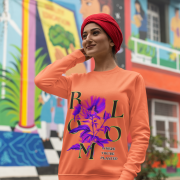 Women’s Vibrant Floral Sweatshirt in coral with Stay Bright design by PodLyft, showcasing vibrant floral graphics for a trendy outfit.