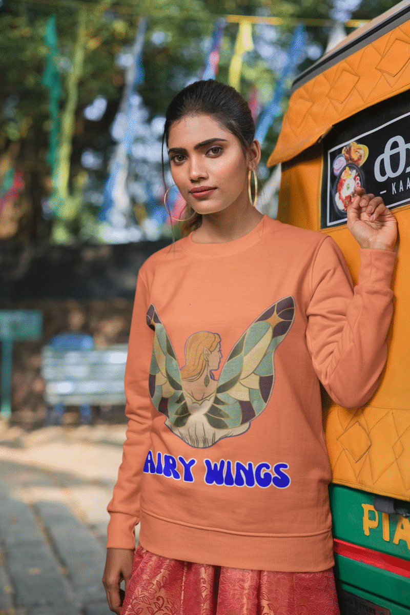 Coral Women’s Fairy Wings Hoodie from PodLyft, with a whimsical fairy wings print, enchanting style, 300 GSM for warmth.