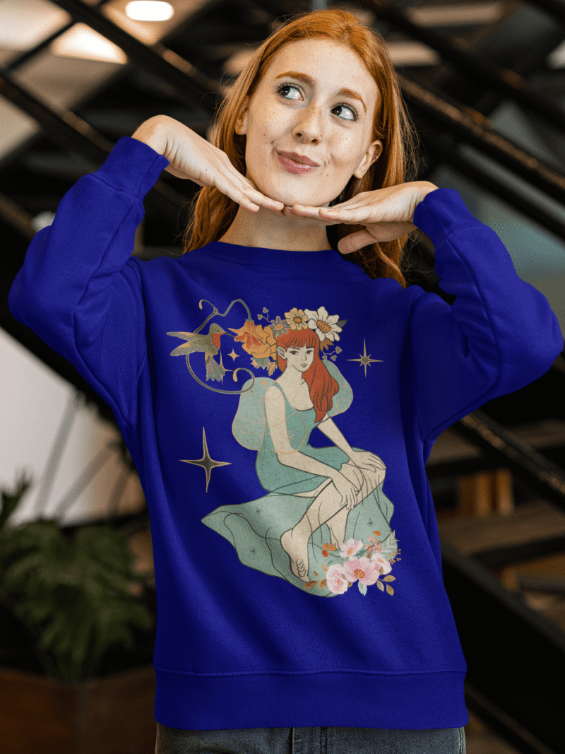 A navy blue Women’s Nature Muse Sweatshirt with a vintage look from PodLyft, displaying a DTG-printed nature-inspired design with floral and leafy patterns on the front, against a white background.