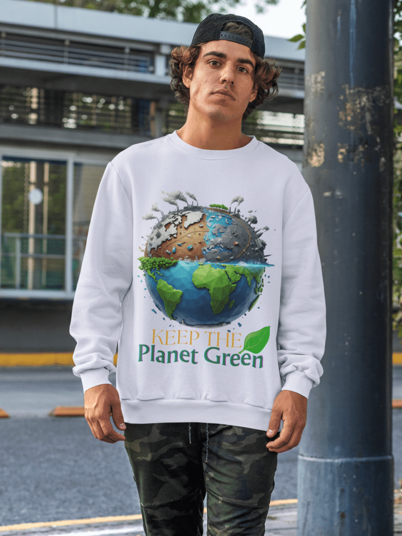 A man wearing a white PodLyft Earth Day Sweatshirt, featuring the "Keep the Planet Green" Earth design, with a black cap on backward, standing outdoors.