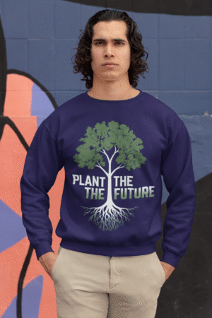 A man wearing a dark blue PodLyft Men's Plant the Future Sweatshirt, featuring a prominent tree design with roots and the text "PLANT THE FUTURE.
