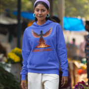 A young woman, possibly of Caucasian descent, with dark hair tied back, wearing a royal blue PodLyft women's Unbreakable Spirit hoodie. The hoodie features a graphic of a stylized, strong female figure in motion, with the word "UNBREAKABLE" across her. She is looking directly at the camera with a determined expression, standing against a plain light grey background.