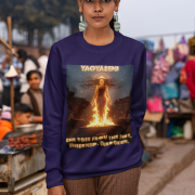 A young woman, possibly of South Asian descent, with long dark hair, wearing a purple PodLyft Yagyaseni Fireborn sweatshirt. The sweatshirt features a stylized graphic of a woman's silhouette against a fiery, abstract background, with the text "YAGYASENI" written below. She is looking directly at the camera with a serious expression, her arms crossed, standing against a plain light grey background.