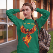 A young woman, possibly of Caucasian descent, with light brown hair pulled back, wearing a bottle green PodLyft Phoenix Reign sweatshirt. The sweatshirt features a graphic of a stylized, fiery phoenix with the text "I BURN I RISE I REIGN" below it. She is looking directly at the camera with a confident expression, standing against a plain light grey background.