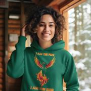 A young woman, possibly of Caucasian descent, with light brown hair pulled back, wearing a bottle green PodLyft Women's Revolution Hoodie. The hoodie features a graphic of a stylized, strong female figure, with the text "I AM THE FIRE I AM THE REVOLUTION" below it. She is looking directly at the camera with a confident expression, standing against a plain light grey background.