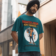 A young man, possibly of Caucasian descent, with short dark hair and a beard, wearing a petrol blue PodLyft Men's Bollywood Swag T-shirt. The t-shirt features a graphic with a funny movie dialogue. He is looking directly at the camera with a confident expression, standing against a plain light grey background.