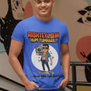 A young man, possibly of Caucasian descent, with short dark hair and a beard, wearing a royal blue PodLyft Men's Bollywood Swag T-shirt. The t-shirt features a graphic with a funny movie dialogue. He is looking directly at the camera with a confident expression, standing against a plain light grey background.