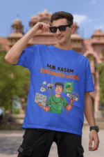 A man wearing a royal blue PodLyft Men's Engineering Stress Tee while holding his sunglasses up on a sunny day. He is standing outdoors with a large, classical building in the background. The graphic on the shirt shows a stressed-out male engineer surrounded by broken electronics, wires, and coffee, with the Hindi text "MAA KASAM ENGINEER HOON" and a book titled "LEARN PYTHON 7 DAYS!