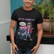 A young man, possibly of Caucasian descent, with short dark hair and a beard, wearing a black PodLyft Log Kya Kahenge T-shirt. The t-shirt features a funny social parody graphic with Hindi text. He is looking directly at the camera with a confident expression, standing against a plain light grey background.