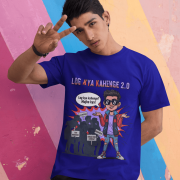 A young man, possibly of Caucasian descent, with short dark hair and a beard, wearing a navy blue PodLyft Log Kya Kahenge T-shirt. The t-shirt features a funny social parody graphic with Hindi text. He is looking directly at the camera with a confident expression, standing against a plain light grey background.