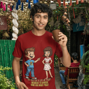 PodLyft Cheesy Pickup Line T-shirt in maroon, worn by a smiling man holding a cup outdoors under colorful decorations. The shirt shows the funny pizza pickup line design.