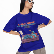Navy Blue Modern Beti Oversized T-shirt – Zero Kaam Attitude Edition by PodLyft. A model wearing sunglasses poses in a dark blue oversized t-shirt with a vibrant "Zero Kaam" graphic print on the front.